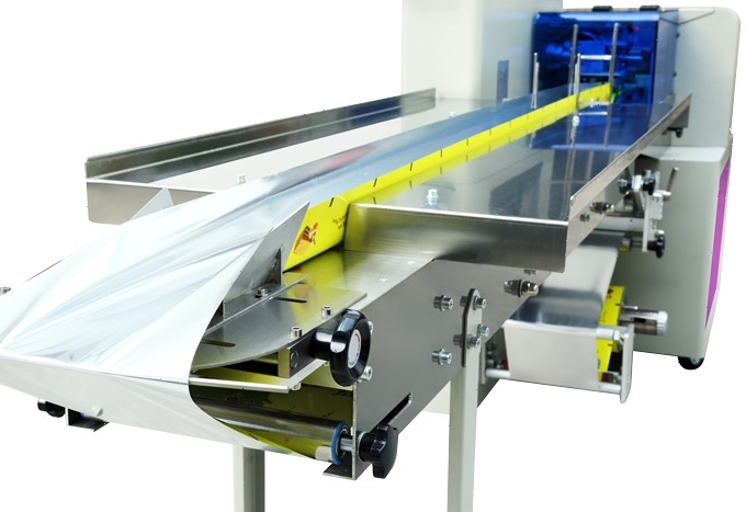 Автомат фасовочно-упаковочный Магикон 250AGXS с сервоприводом, размотка пленки на транспортер